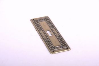 Sleutelplaat langs voor deurtjes brons antiek 33mm (zamac)