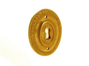 Klassieke sleutelplaat ovaal brons antiek voor meubelen 53mm verticaal.