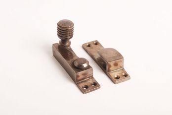 Hefboomsluiting bijenkorf geveerd brons antiek 71mm