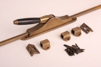 Pompespagnolet Tonmodel brons antiek en ebbenhout met 2 stangen